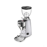 The Mazzer Mini Type A V2 Electronic Grinder (Silver) by Mazzer features 64mm flat burrs, a clear bean hopper, digital controls, dosing chute, and portafilter holder. Shown in silver and black against a plain white background.