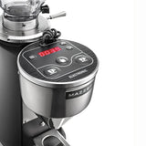 A close-up of the Mazzer Mini Type A V2 Electronic Grinder (Dark Grey) by Mazzer highlights its digital display, round control panel with buttons, and stainless steel flat burr grinder chamber against a white background.