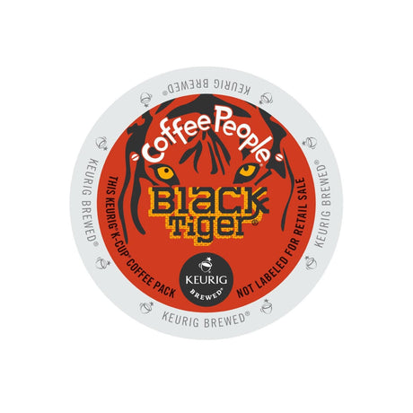 A circular coffee pod label for "Coffee People Black Tiger Extra Bold K-Cup® Pods (Box of 24)" by Coffee People. The label is white with a stylized image of a tiger's face in shades of orange and black in the center, emphasizing its Dark Roast. Text around the edge reads "This Keurig K-Cup Coffee Pack Not Labeled for Retail Sale.