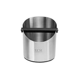 The ECM Round Knock Box, a brushed stainless steel knock box with a black knock bar across the top for disposing of used espresso pucks, is shown against a white background with the ECM logo prominently displayed on the front.