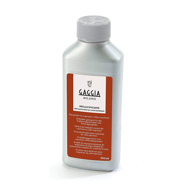 A 250ml bottle of Gaggia Decalcifier Liquid Descaler Solution for espresso coffee machines, essential for regular coffee machine maintenance. The silver bottle with a white screw cap features an orange and white label detailing product information and descaling instructions in multiple languages.