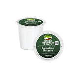 A Green Mountain Sumatra Reserve Single-Origin K-Cup® Recyclable Pod from a box of 24, designed for Keurig machines. The pod features a green and white design, indicating it is fair trade certified and organic. This dark roast coffee offers a rich flavor but is not labeled for retail sale.