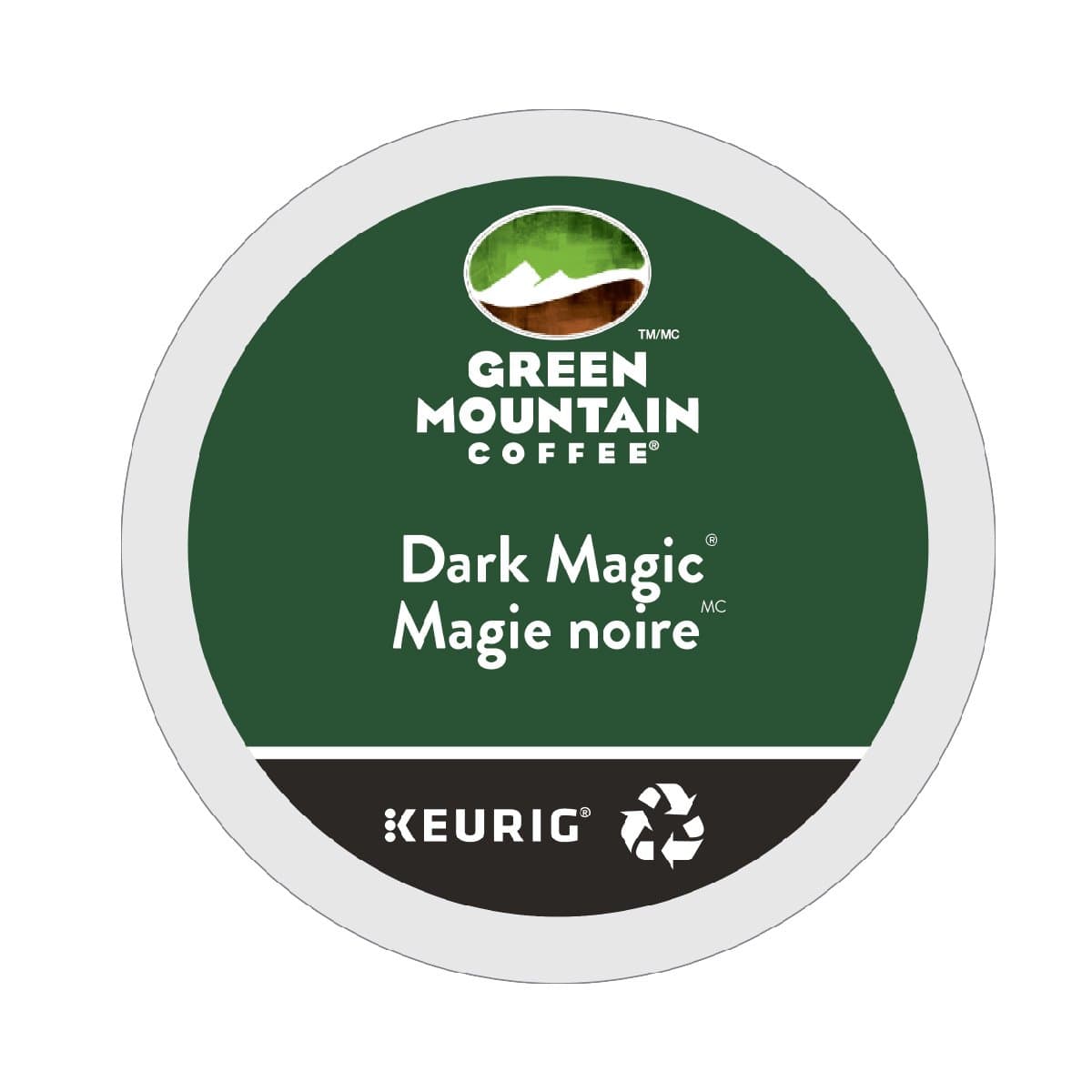 A Green Mountain Dark Magic K-Cup® Recyclable Pod with a green and white label. The top features the brand logo with a mountain design, and the text reads "Green Mountain Coffee Dark Magic" in English and "Magie noire" in French, above the Keurig logo. Made from 100% Arabica beans. Packaged in a box of 24 pods.