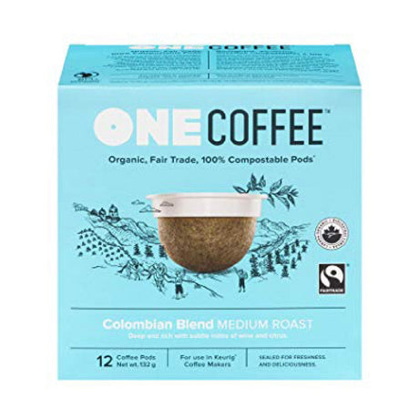 A blue box labeled "OneCoffee" contains eighteen Colombian Blend Medium Roast single-serve pods. The box features organic, fair trade, and 100% compostable claims. The front displays an image of a coffee pod and certification logos.