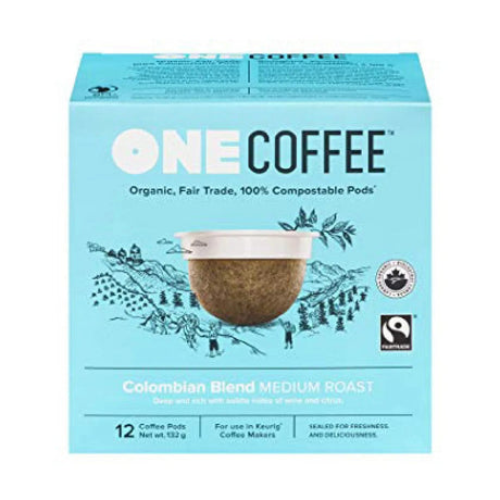 A box of OneCoffee Colombian Blend Single-Serve Pods (Case of 72) displays a blue design featuring text that highlights 12 organic, fair trade, 100% compostable pods made from 100% Arabica beans for use in Keurig coffee makers. The packaging also includes a mountain landscape and a coffee pod graphic.