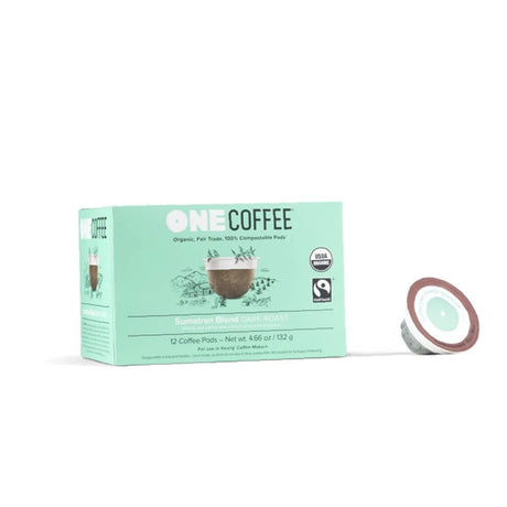 A case of OneCoffee brand Sumatran Single-Serve Pods. The packaging features green, black, and white text along with an image of a coffee cup on the front. A single pod is shown next to the box, which contains 72 organic and fair trade Arabica beans pods.