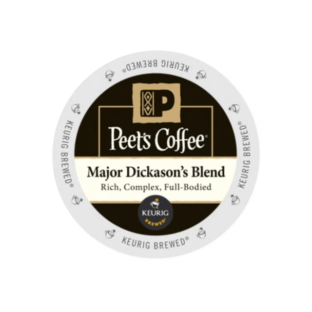 A circular K-cup pod for Keurig brewers featuring Peet's Coffee Major Dickason's Blend, the bestselling dark roast from Peet’s Coffee, comes in a case of 60. The black and white label emphasizes its rich, complex, and full-bodied flavor. The "Peet’s Coffee" logo graces the top while the Keurig logo is placed at the bottom.