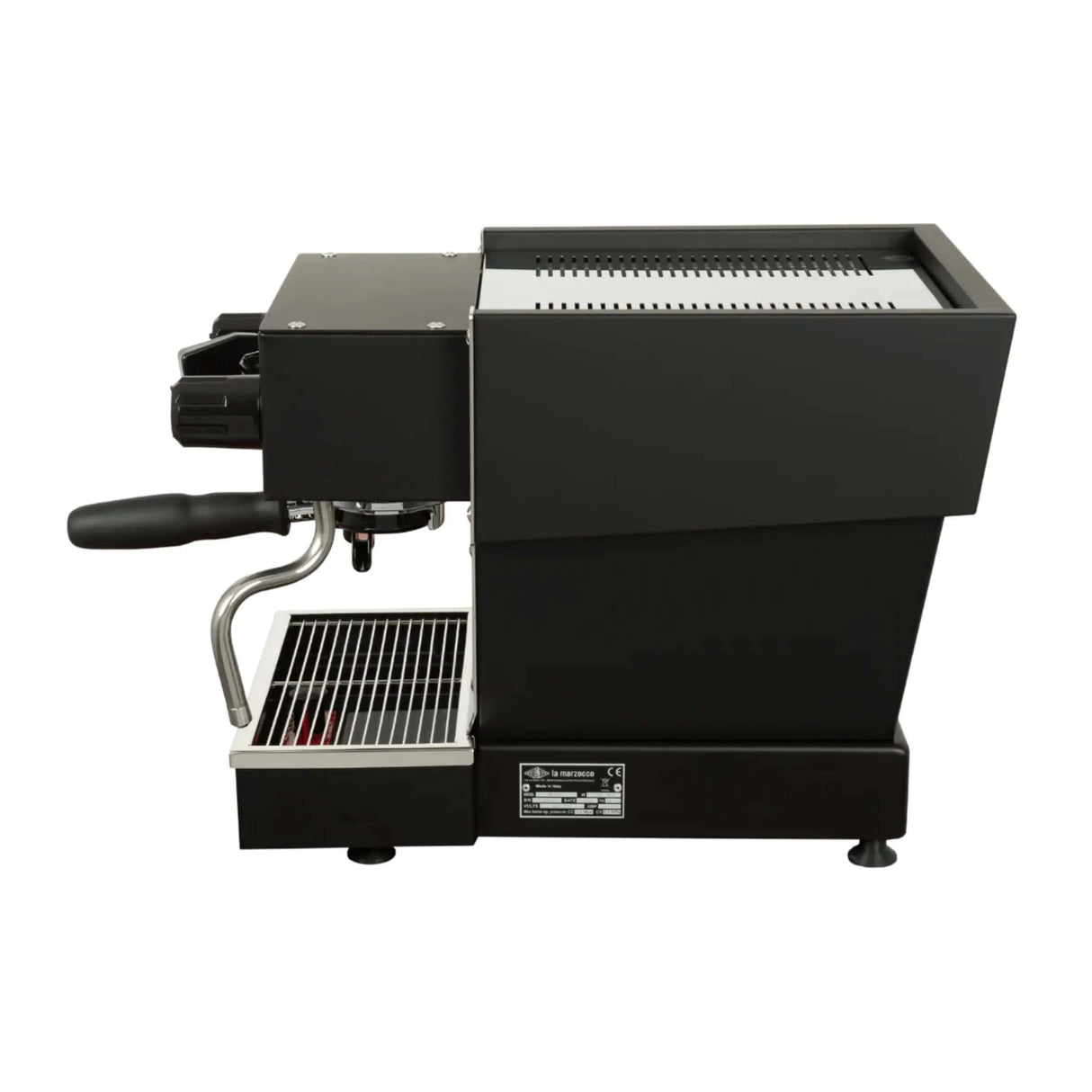 The La Marzocco Linea Micra Espresso Machine (Black) boasts a sleek, polished rectangular body with a portafilter handle extending from the left side. It features a metal grid drip tray below and a modern design that includes visible screws on the side panels and a power switch at the base. Utilizing dual boiler technology, this espresso machine combines premium functionality with contemporary aesthetics.